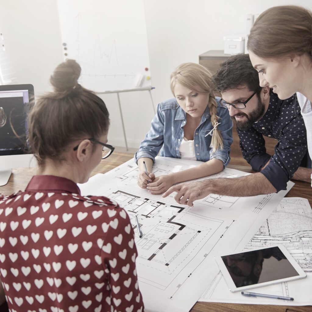 Zespół architektów i branżystów.